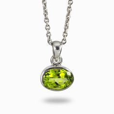 Vivid grassy green with a fiery sparkle, wear this juicy, fresh green gem to add a touch of luxury to your look. Peridot emits warm and friendly energy. Also known as the “gem of the sun”; Ancient Egyptians felt the warm glow of the sun’s energy through the vivid, green glimmer. Peridot provides a shield of protection for its wearer and is an excellent healing stone that helps one strengthen and regenerate the body and mind. Stone Origin: Pakistan Please Note: All pieces shipped within 48 hours Mind Stone, Green Gem, Peridot Crystal, Sun Necklace, Peridot Jewelry, Peridot Pendant, Ancient Egyptians, Oval Necklace, Peridot Necklace