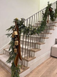 christmas decorations on the banisters and stairs