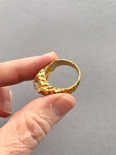 Super swanky PAIR of vintage 70's / 80's 18k / Kt heavy gold electroplate cubic zirconium / cz men's size 10 rings. One maintains the tag. Perfect for the gaudiest over the top wedding! In like new vintage condition. Size 10 Contact us with any questions, and please read our shop policies for full details. Gold Dome Ring With 17 Jewels For Wedding, Vintage Gold Signet Ring With Rose Cut Diamonds, Gold Hallmarked Crystal Ring For Anniversary, Hallmarked Gold Crystal Ring For Anniversary, Vintage Gold Diamond Ring With Vvs Clarity, Gold Rings With Rose Cut Diamonds For Collectors, Vintage Yellow Gold Crystal Wedding Ring, Gold Diamond Ring With Rose Cut Diamonds For Collectors, Vintage Gold Signet Ring With Diamond Cut