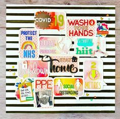 a collage of stickers on a wooden surface with black and white striped background