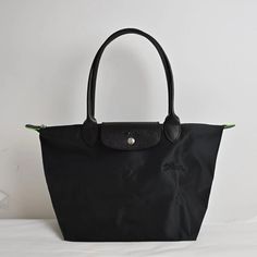 Reposhing This Item I Purchased From @Cathy_jean. Loved It, But Ready To Rotate For Something New. Questions? Leave A Comment Below! Tote Bag Size, Longchamp Handbags, Longchamp Bags, Black On Black, Black Stains, Womens Tote Bags, Something New, Classic Black, Stain