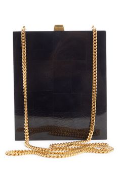 Finish off formal ensembles with this perfectly structured box bag centered by the signature YSL insignia. Push-clasp closure Crossbody chain strap Structured silhouette with flat base for stability Synthetic Made in Italy Designer Handbags Designer Rectangular Case Evening Bag, Formal Rectangular Bag With Gold-tone Logo Plaque, Formal Bag With Chain Strap And Rectangular Case, Formal Rectangular Case Bag With Chain Strap, Modern Gold Evening Bag For Formal Events, Modern Formal Evening Bag With Rectangular Case, Designer Rectangular Evening Bag With Chain Strap, Designer Evening Bag With Chain Strap, Designer Square Evening Bag For Formal Occasions