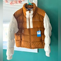 New With Tags Columbia Women’s Pike Lake Ii Cropped Puffer Jacket. Large In Camel Brown/Chalk. Super Cute Style And Beautiful Colors! Very Warm :) Retail $140. Details: A Puffer You Can Wear Anywhere With Built-In Warmth And An Eye-Catching Silhouette. An Advanced Thermal-Reflective Lining Retains Body Heat While 100% Recycled Polyester Insulation Adds Warmth. Pfc-Free Water Repellency And Zippered Security And Hand Pockets Deliver Added Protection And Utility. Omni-Heat Thermal Reflective Insul White Fall Puffer Jacket For Outdoor Activities, White Puffer Jacket For Fall Outdoor Activities, Columbia Vest, Outdoor Vest, Cropped Puffer Jacket, Columbia Fleece, Columbia Jacket, Cute Style, Quilted Vest