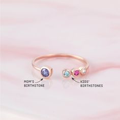 "♥ Custom Birthstone Ring ♥ Customed by kids' birthstones, this beautiful and dainty ring is a perfect gift for your mom or your loved one. P R O D U C T ∙ I N F O * Material: Solid 925 Sterling Silver * Finishing: Silver - Yellow Gold - Rose Gold * Up to 1 big stone, 5 small stones * Big stone measures approx. 1/8'' (3mm) , Small stones measure approx. 1/16'' (2mm) H O W * T O * O R D E R 1. Select the drop-down option you want 2. Please let us know the following information in the \"Add your p Custom Birthstone Ring, Birthstone Ring Mothers, Gifts For New Mothers, Mothers Day Gift Ideas, Birthstone Stacking Rings, Mothers Ring, Birthstone Rings, Mom Ring, Fingerprint Jewelry