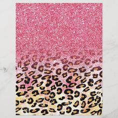 the pink and gold glitter leopard print is on top of a white marble background with black spots