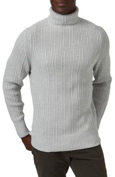 Start off your layered looks with this timeless turtleneck sweater knit in a chunky gauge. Turtleneck Long sleeves 52% viscose, 26% polyester, 22% nylon Machine wash, tumble dry Imported Knit Turtleneck With Ribbed Cuffs For Layering, Casual Chunky Knit Turtleneck For Layering, Casual Wool Turtleneck With Chunky Knit, Casual Wool Chunky Knit Turtleneck, Casual High Neck Merino Wool Sweater, Casual Wool Turtleneck For Layering, Casual Chunky Knit Wool Turtleneck, Stretch Ribbed Merino Wool Sweater, Chunky Knit Turtleneck For Layering