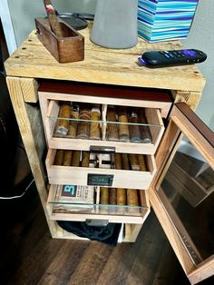 a wooden cabinet filled with lots of different items