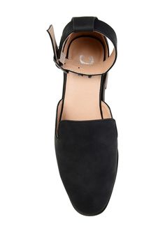 If you're looking for the perfect flat for the season, look no further than the Loreta flat by Journee Collection. This flat features a loafer style with a unique square toe shape. This shoe is very breathable, and the thick ankle strap completes this back to school ready design. Sizing: True to size. M=medium width. Square toe. Ankle buckle closure. Approx. 1" heel height. Imported Ankle Strap Pointed Toe Flats With Buckle For Work, Spring Pointed Toe Flats With Ankle Strap And Buckle, Work Flats With Buckle Closure And Flat Heel, Spring Workwear Pointed Toe Flats With Buckle Closure, Workwear Flats With Buckle Closure, Black Ankle Strap Flats With Buckle Closure, Trendy Flats With Buckle Closure, Casual Mary Janes With Pointed Toe And Buckle Closure, Casual Flats With Buckle Closure Medium Width