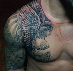 a man's chest with an eagle tattoo on his left arm and shoulder is shown