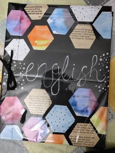 a bag with the word english written on it and hexagons in different colors