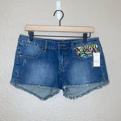 Stetson Women’s Cutoff Jean Shorts Brand New With Tags!! Size 8 Beaded Pocket And Belt Loops Approx. 2.5” Inseam Light Blue Wash Denim Cutoff Style Button/Zipper Fly Boho Gypsy Cowgirl Vibes! Adorable For Summer And Fall, Concerts And Festivals, Etc. Great Condition!! No Holes, No Stains, No Tears. R And New With The Tags! Casual Embroidered Cutoff Jean Shorts, Embroidered Denim Jean Shorts In Blue, Embroidered Medium Wash Denim Jean Shorts, Trendy Embroidered Cutoff Jean Shorts, Embroidered Blue Cotton Jean Shorts, Casual Mid-rise Embroidered Jean Shorts, Casual Embroidered Mid-rise Jean Shorts, Blue Floral Embroidery Cutoff Jean Shorts, Floral Embroidered Cutoff Denim Jean Shorts