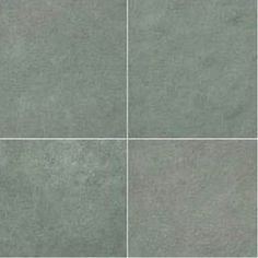 four square tiles with different shades of grey