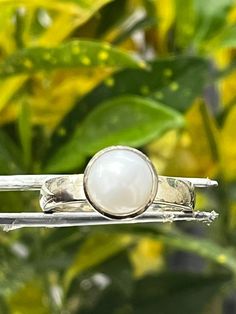 natural south sea pearl Moti  ring stone weight is 5.25- 12.25 ratti ,round gems, ring   925 starling silver ring  handmade ring for luck and astro purpose use and daily wear ,  we provide custom changes in this design like stone weight , stone type ,silver colour customer custom order by pearl colour we have about 15 colour of pearl like white , black ,blue ,brown ...like many Pearl Drop Diamond Ring, White Pearl Drop Ring, White Pearl Ring With Bezel Setting For Wedding, White Oval Pearl Ring With Gemstone, White Pearl Ring For Anniversary, White Oval Pearl Drop Rings, High Luster White Pearl Ring For Anniversary, Classic White Pearl Ring With Bezel Setting, White Pearl Ring With Bezel Setting In Classic Style