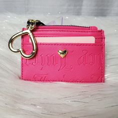 -Pink Cardholder With "Juicy" Embossed All Over It And Has Gold Mini Heart With "Juicy" Embossed On It -Has Zippered Coin Pocket And Holds Up To 4 Cards -Has Gold Heart Keychain -New With Tags. No Damages Dimensions: W:4½ H:2¾" Trendy Pink Card Holder With Card Slots, Trendy Pink Wallet With Card Slots, Trendy Pink Wallets With Card Slots, Trendy Pink Card Holder Gift, Black Bifold Wallet, Couture Bags, Juicy Couture Bags, Heart Keychain, Short Wallet