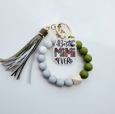 a keychain that says, don't be a mama ever with beads and tassels