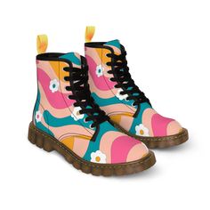 NOTE: You can expect extended delivery times on this item if ordered between September 25 and October 3. Carriers will return to their regular shipping times by October 4. Take a vibrant step back in time with our Women's Retro Groovy Canvas Boots. Radiating the spirit of the '60s and '70s, these boots will have you dancing through life with a spring in your step. From their eye-catching print to their quality construction, they're designed to boost confidence and invite onlookers to join you in Vintage Multicolor Boots For Fall, Retro Multicolor Boots With Round Toe, Retro Multicolor Round Toe Boots, Retro Multicolor Boots For Fall, Multicolor Retro Boots For Fall, Funky Spring Boots, Vintage High-top Boots For Spring, Vintage Fitted Boots For Spring, Retro Summer Boots With Round Toe