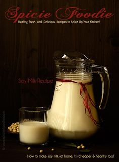 a pitcher of milk next to a glass full of milk