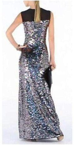 Go for glamorous evening appeal with this shimmering sequin-embellished gown. Round neck. Sleeveless. Allover sequin embellishment with mesh contrast at yoke. Button-closure keyhole at upper back. Sequined Mesh: Nylon, Spandex. Chiffon: Polyester. Dry Clean. Sparkling Sleeveless Sequin Evening Dress, Sleeveless Sparkling Sequin Evening Dress, Evening Embellished Sleeveless Sequin Fabric, Glamorous Floor-length Contrast Sequin Fabric, Glamorous Sleeveless Evening Dress With Contrast Sequin, Glamorous Sleeveless Contrast Sequin Evening Dress, Glamorous Floor-length Sequin Dress With Contrast Detail, Sleeveless Contrast Sequin Evening Dress For Night Out, Sleeveless Evening Dress With Contrast Sequin