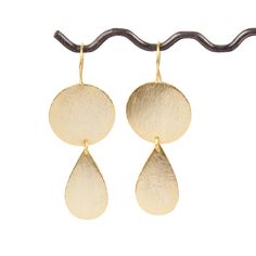 Specification of earrings: Plating : Matte Finish Metal : Brass Color: Gold earrings Length: See The Variation Shape: Fancy Shape You will receive exact as picture of earrings made with a matter finsh . The trimmed. The color is gold with patterns, which looks beautiful outlined in brass gold plated . These quartz are beautifully made and packed with sparkle. These are perfect for parties and celebrating with just a little bit of glamour. They are perfect for bangles These are so incredibly beau Minimalist Teardrop Earrings For Party, Round Brass Earrings For Party, Brass Round Earrings For Party, Brass Earrings For Parties, Party Drop Linear Earrings With Ear Wire, Brass Earrings With Ear Wire For Party, Adjustable Teardrop Earrings For Party, Party Brass Dangle Earrings, Adjustable Brass Earrings For Party