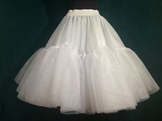 Made of: Rayon, tulle, organza White Tulle Petticoat For Prom, Fitted Tulle Petticoat For Wedding, Fitted Organza Petticoat With Ruffles, White Organza Petticoat For Party, Spring Wedding Organza Petticoat, Fitted Vintage Tulle Petticoat, Fitted Tulle Petticoat With Ruffles, Spring Wedding Stretch Petticoat, Fitted Tulle Petticoat For Spring