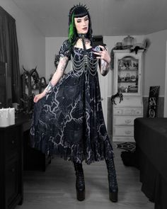 Spiders, webs and haunted trees - make the print on this cute flowy dress perfect for Halloween and those of us who love to celebrate spooky season all year round!

With corset detailing on the bodice and a frilled hem - it's still got the right amount of cute ✨

🖤 Pic by misseydis on IG 🖤 Summer Gothic Corset Dress, Spring Gothic Lace Corset Dress, Cute Flowy Dresses, Sheer Lace Gothic Dress, Sheer Gothic Mini Dress, Nu Goth Fashion, Rockstar Style, Killstar Dress, Essential Dress