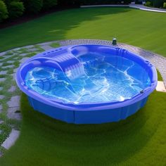 an above ground swimming pool in the middle of a lawn