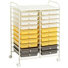 a white cart filled with lots of yellow and grey drawers