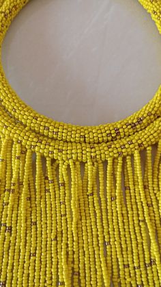 Green African Beaded Necklace, African Jewelry, Handmade necklace, Masai Necklace, Tribal Jewelry, Women Necklace, Christmas giftt This elegant statement necklace is made of fine Beads. 100% handmade Closure: hook Color: Yellow. Available in different colors, please select on the color option shown. Neck width: 17 inches Fringe width 16 inches 3-5 days delivery via DHL Express The shipping fee is for the first item only and additional items ship for free. For any clarification ...please send an Masai Necklace, African Beaded Necklace, Elegant Statement Necklace, African Beads Necklace, Brass Cuff, Brass Bracelet, Women Necklace, African Beads, African Jewelry