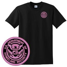 "Dept. of Homeland Security FEMA Embroidered Tee Shirt Pink Cancer Awareness Logo #721 Design is embroidered on the Left chest only. This is Not Screen Printed or a Cheap Patch! Size Med. to 5XL Available in Black or Navy GILDAN® DRYBLEND® 50/50 T-SHIRT G8000 * 5.6 oz. 50/50 preshrunk cotton/polyester jersey knit * Seamless double needle 7/8\" collar * Taped neck and shoulders * Heat transfer label * Quarter-turned to eliminate center crease * Double needle sleeves and bottom hems * Moisture wic Embroidered Tee Shirt, Embroidered Polo Shirts, Cloth Flowers, Embroidered Tee, Clothing Patches, Embroidered Clothes, Homeland Security, Clothing Labels, Fashion 2020