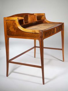 an old wooden desk with drawers on it