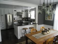 the kitchen is clean and ready to be used as a dining room or family room