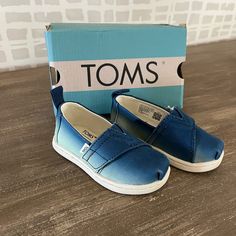 New In Box Super Cute Little Kids Tom’s Slip On Shoes. They Are A Blue Ombr Color And Just Adorable. Comes With Box. Size 5 Toddler Blue Canvas Shoes With Rubber Sole, Closed Toe, Comfortable Blue Canvas Shoes, Casual Blue Canvas Shoes With Closed Toe, Blue Sneakers With Soft Sole And Round Toe, Blue Round Toe Sneakers For School, Casual Blue Sneakers For Playtime, Blue Slip-on Sneakers With Soft Sole, Blue Low-top Canvas Shoes For School, Pink Sparkly Shoes