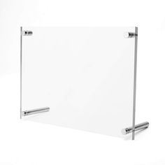 a glass board with two metal handles on the bottom, and a white back ground