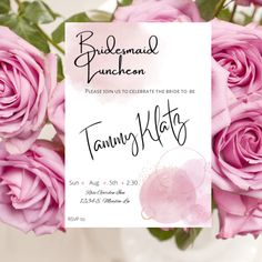 a bouquet of pink roses in front of a white card with the words, bridesmal luncheon please you to celebrate the bride to be