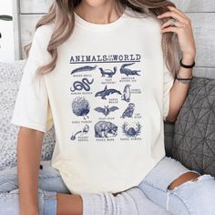 Animals Of The World Comfort Colors Shirt, Funny Animal Names Shirt Discover Our Newest Collection Of Stylish And Adaptable T-Shirts (Gildan 5000), Where Fashion Meets Comfort! Available In A Wide Range Of Sizes From S To 3xl And Lively Color Choices Including Black, White, Sand, Green, Sport Grey, Red, Navy, And More, Ensuring There's Something For Everyone. Carefully Crafted With Premium Materials, Our T-Shirts Offer A Luxurious Feel And A Snug Fit That Lasts All Day. Engineered To Withstand F Funny Animal Names, Animal Names, Comfort Colors Shirt, Animal Tshirt, Animals Of The World, Animal Shirts, White Sand, Funny Animal, Color Choices