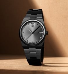 Classic Matte Black Watches With Subdials, Timeless Matte Black Watch With Subdials, Timeless Matte Black Watch Accessories With Subdials, Modern Matte Black Quartz Watch, Matte Black Modern Quartz Watch, Matte Black Metal Dial Watch For Formal Occasions, Matte Black Watch With Subdials, Modern Black Chronograph Watch With Date Indicator, Matte Black Analog Watch With Round Dial