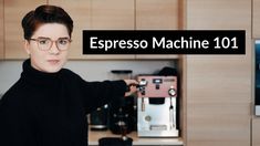 a woman standing in front of a coffee machine with the words espresso machine 101 on it