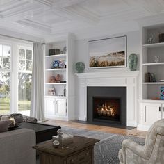 a living room with a fireplace, tv and chair