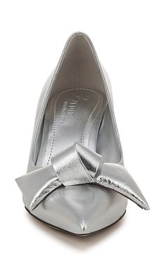 Bring sculptural finesse to ensembles with this bow-topped pump that's elevated on a curved block heel. Flexibility, support and shock absorption ensure style is balanced with comfort. Cushioning: absorbs impact and distributes weight for consistent, buoyant comfort under each step 2 3/4" heel Cushioned footbed with arch support and molded cup heel Slip-resistant sole Leather upper/synthetic lining/rubber sole Imported Silver Heels With Bow For Formal Occasions, Spring Silver Heels With Bow, Pointed Toe Heels With Silver-tone Hardware For Evening, Silver Kitten Heels With 4-inch Heel, Silver Glamorous Slingback Pumps With 4-inch Heel, Metallic Silver Heels With 4-inch Heel Round Toe, Metallic Silver Pointed Toe Heels With 4-inch Heel, Nordstrom Store, Arch Support