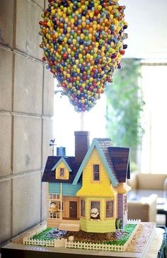 an instagram page with a house made out of candy balls and the caption instagram