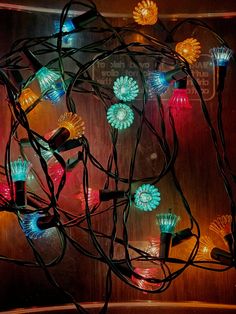 colorful lights are strung up on the wall