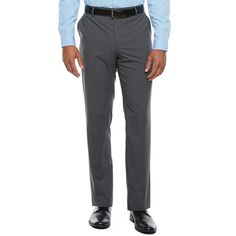 For an effortlessly tailored look, whether worn with the matching blazer and a t-shirt or a button-down, pull on this pair of men's suit pants by J. Ferrar. Made from a stretch woven-blend, this charcoal grey dress pant is cut for a slim-fit with a straight-leg that hits right at the ankle. They are complete with a hook-and-eye with a zip closure, belt loops, and side and back pockets.Front Style: Flat FrontFeatures: Stretch Fabric, Adjustable WaistClosure Type: Button W/Hook&eye, ZipperFit: Sli Tailored Suits With Long Pants For Work, Classic Business Suits With Long Pants, Classic Suits With Long Pants For Workwear, Classic Long Pants Suits For Workwear, Tailored Professional Pants For Office Wear, Professional Business Casual Pants With Welt Pockets, Professional Business Casual Pantsuit With Welt Pockets, Flat Front Suiting Fabric Pants For Office, Business Slim Fit Suits With Long Pants