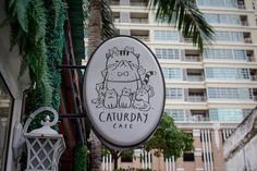 there is a sign that says caurday cafe