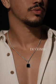 Enjoy our photo gallery. Real customers like you. Real customer satisfaction!  Inspired by the classy look of Hollywood actors,  our pendant necklaces are the perfect solo piece to add some style to your look or layer it with any of our other pendant necklaces. You'll definitely catch complements from someone with this around your neck!   Our Onyx pendants are available in both 18K Gold and Silver.  ▼ Details & Specifications ▼ ♚ Chain Length: 53cm ♚ Chain Width: 2mm ♚ Chain Style: Micro-curb chain ♚ Pendant Size: 20mm x 20mm ♚ Chain Quality: 18k Gold or Silver Premium 316L Stainless Steel ♚ Chain Clasp: Reinforced Lobster ring clasp ♚ Synthetic Onyx Stone detailing ♚ Branded etching ♚ Hypoallergenic, water and sweat resistant ♚ No discoloring or tarnishing ♚ Handmade ♚ Designed in Italy ♚ Minimalist Black Jewelry For Father's Day, Black Sterling Silver Jewelry For Father's Day, Father's Day Black Sterling Silver Necklace, Elegant Black Rope Chain Necklace, Black Pendant Jewelry With Rope Chain, Black Rope Chain Necklace For Gift, Formal Black Stainless Steel Necklace, Elegant Black Jewelry For Father's Day, Modern Black Square Pendant Jewelry