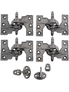 four pieces of black iron furniture latchs with screws on each side and two holes in the middle