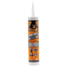 the bottle of gorilla heavy duty adhesiveant is shown on a white background,