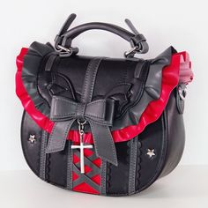 This adorable crossbody bag is versatile and matches well with many coords, including gothic lolita style and punk alternative outfits. It's also wonderful to use as a cosplay accessory to rep your favourite character, or as a day to day bag. It features a classic colour palette of black and red, has the cutest little Gothic Purse, Demon Wings, Gothic Bag, Everyday Cosplay, Classic Color Palette, Punk Accessories, Quality Handbags, Cute Purses, Alternative Outfits