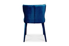 a blue velvet chair on a white background