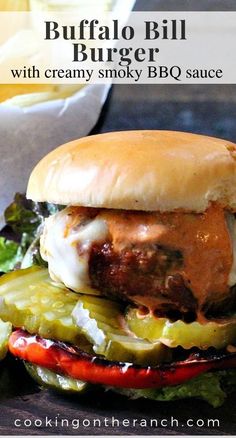 a close up of a burger on a wooden table