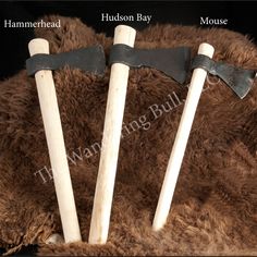 three hammers are placed on top of a brown fur covered surface with the words hammerhead, hudson bay and mouse